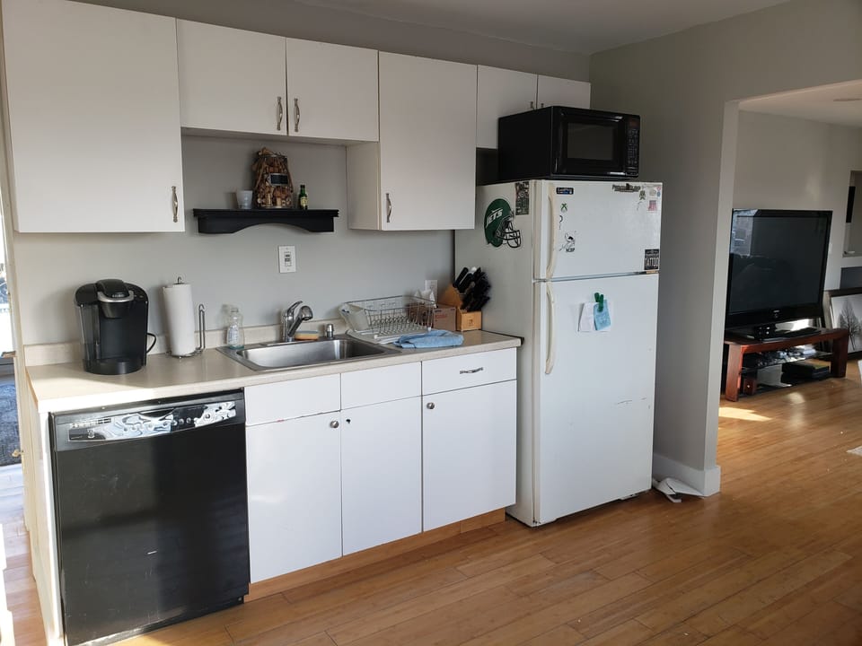 Kitchen :Dish waster, oven (not shown), fridge, freezer, microwave and keurig