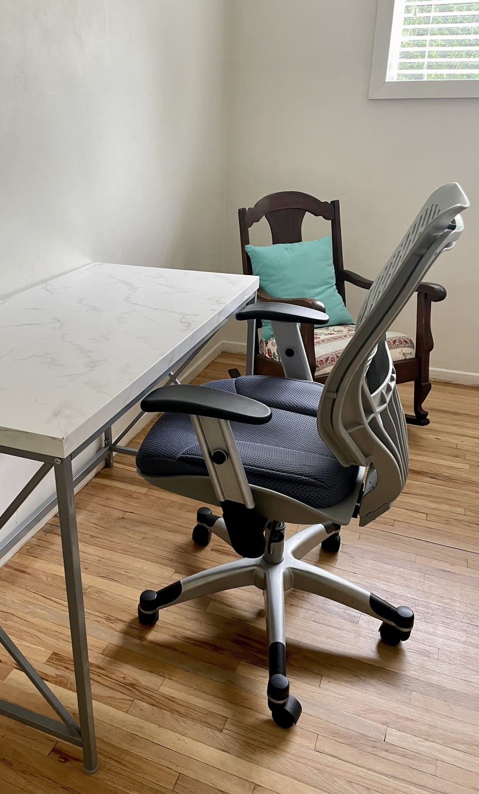 Middle bedroom desk with comfortable office chair