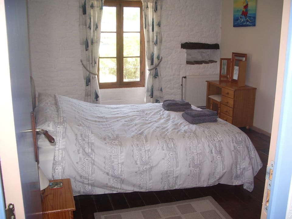 One of the bedrooms with the king sized bed