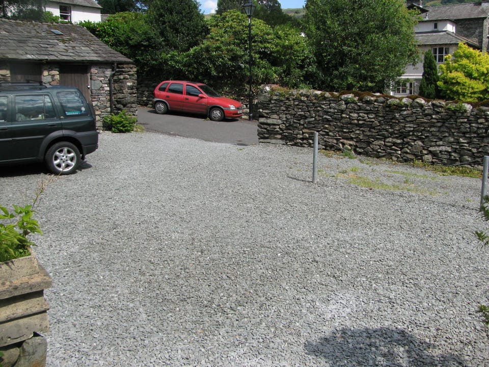 Parking forecourt and secure cycle storage.