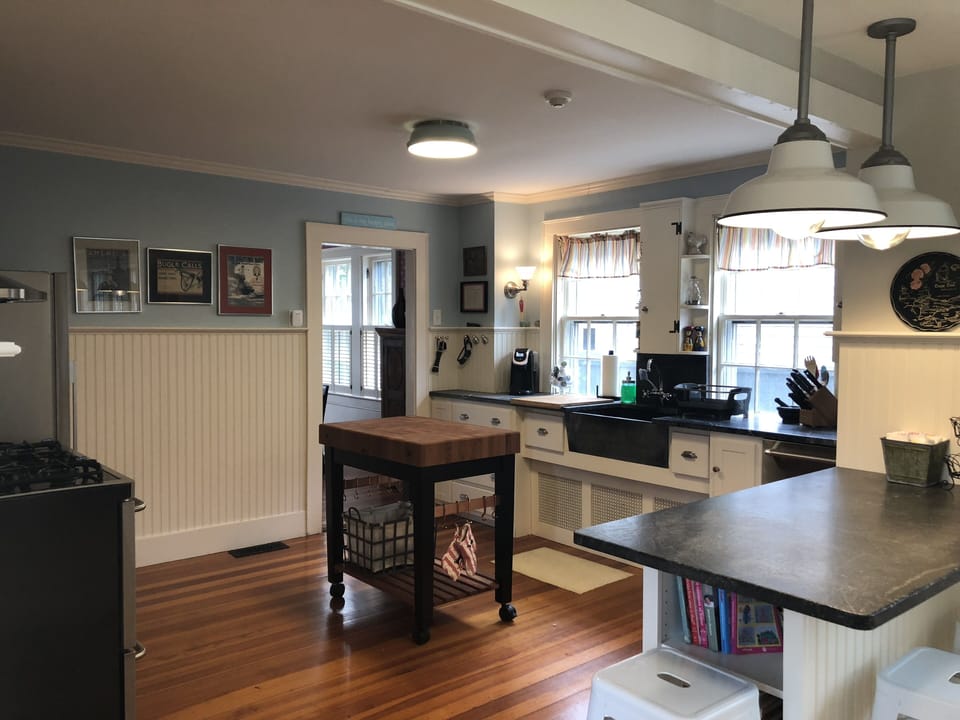 Kitchen with 5 Burner Gas Stove/Electric Oven Combo and Boos Butcher Block.

