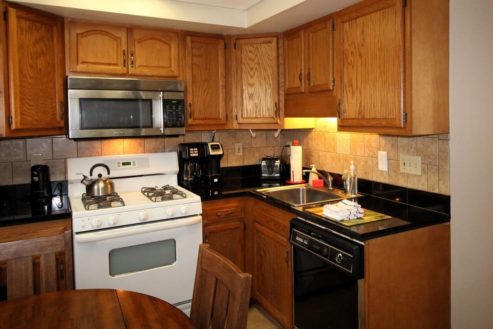 Fully equipped kitchen with granite countertops