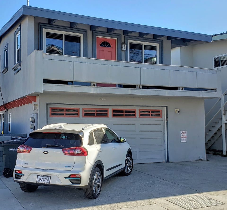2 parking spots, 1 inside garage and 1 outside for standard cars-small suvs