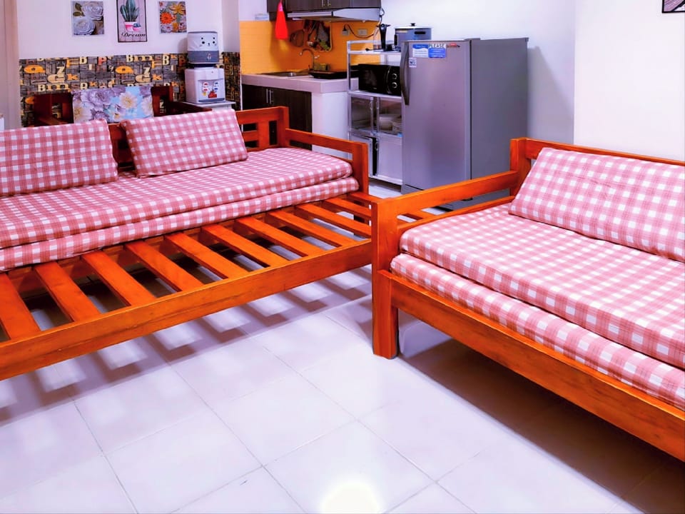 2 Expandable sofa beds convert to queen Sleeper for 4 pax