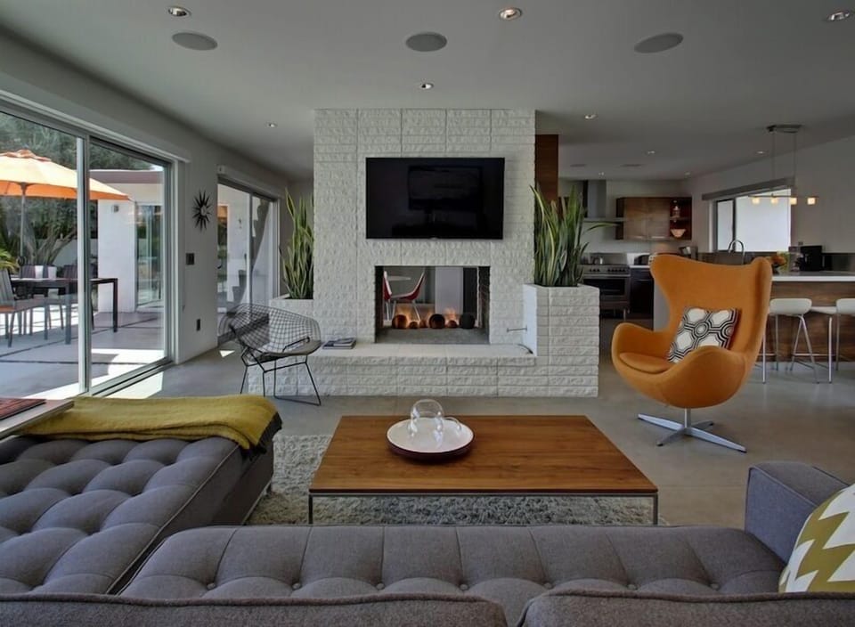 The Original Fireplace is Central to the Large Open Floor Plan