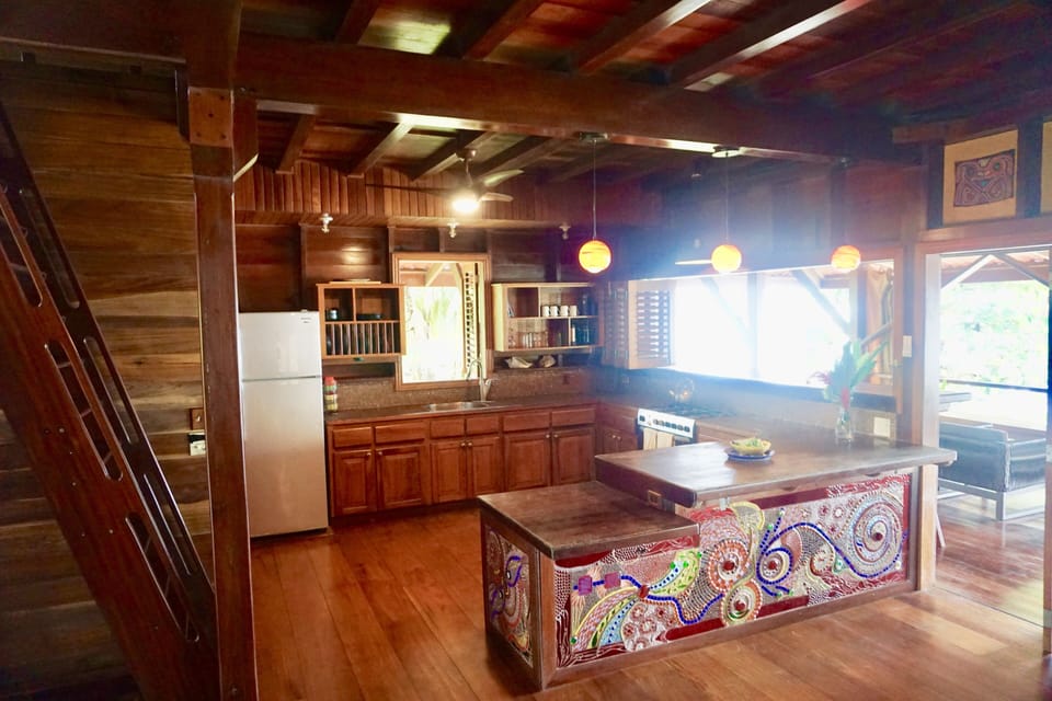 Kitchen opens out to front patio