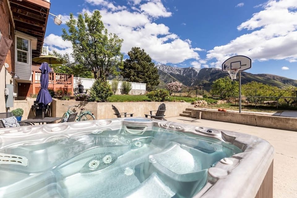 Relax in the hot tub urrounded by amazing views!