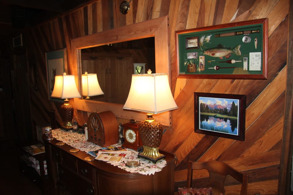 Antique side board and wall art. Five foot wall mirror.