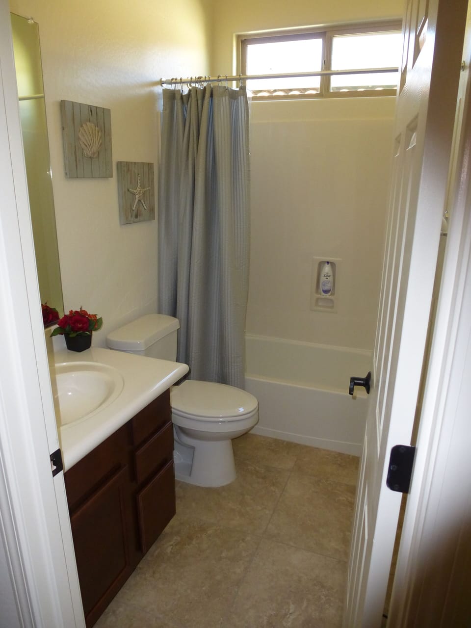 Bathroom includes combination tub and shower