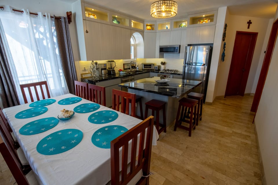 Dining room and kitchen.