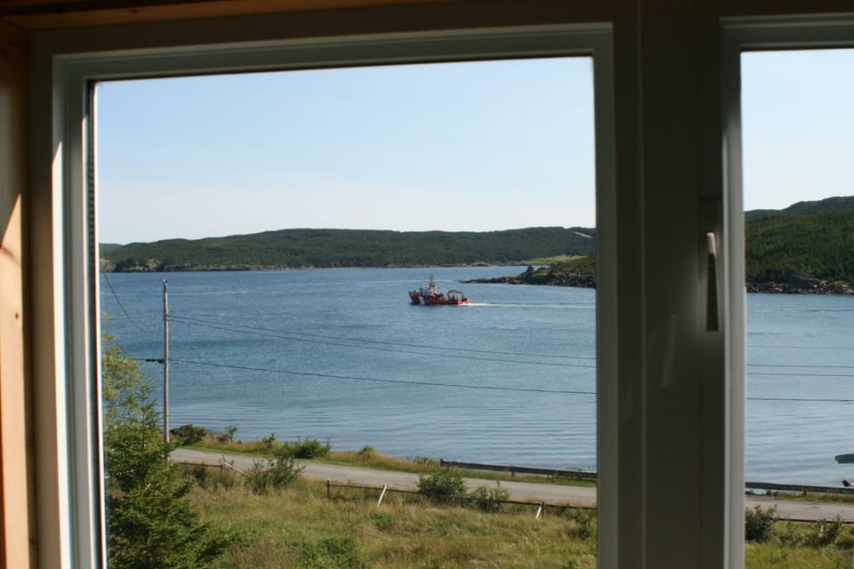 View from living room with coastguard patrol in cove