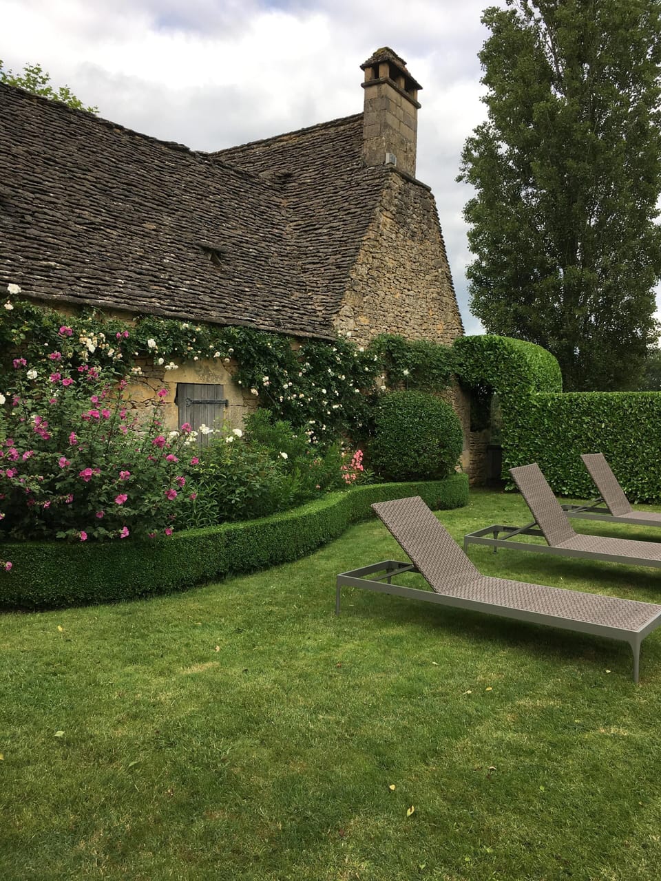 Chaises longues for relaxing by the pool. Beach towels provided.