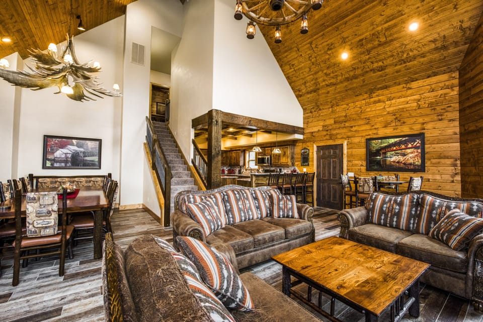 Spacious and comfortable living room with open floor plan to kitchen & dining