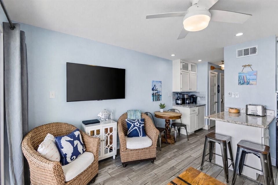 Unwind with cable on the Smart TV, then grab a board game—this remodeled Galveston beachfront condo makes nights in easy.