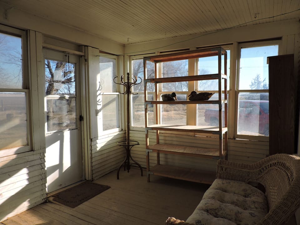 Glassed in back porch entrance