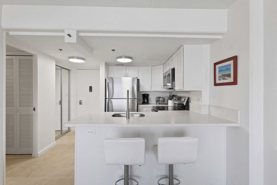 Kitchen - Newly and completely renovated with stainless steel appliances cabinets and countertops.