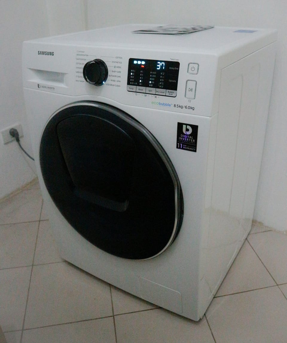 Automatic washer/dryer
