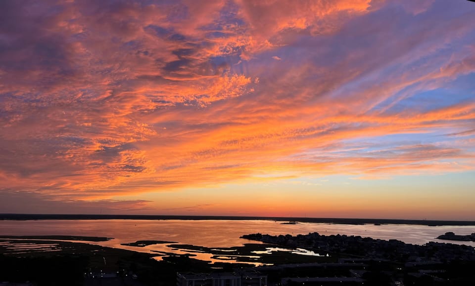 The full glass-wall sunset views from both bedrooms are epic. 