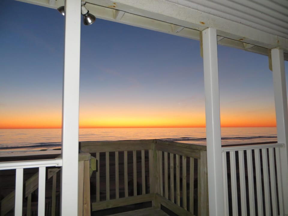 Sunrise at Serenity from the back covered porch!!
