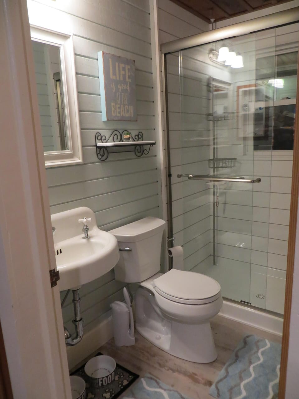 Fully Renovated Bathroom with Ship-lap Shower. Watch the surf from the shower.