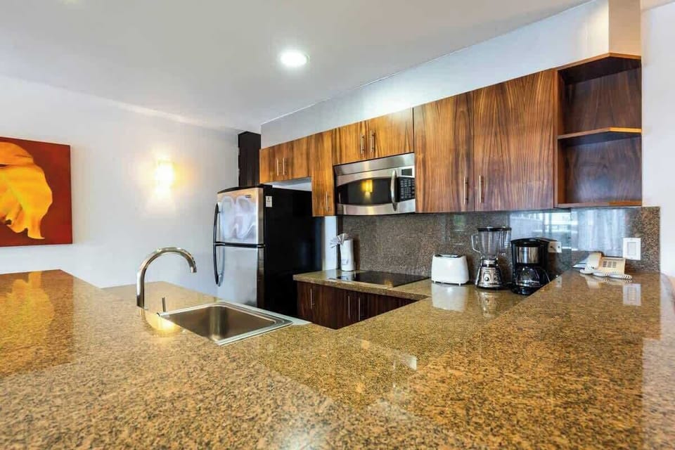 Whip up culinary delights in your well-equipped kitchen.