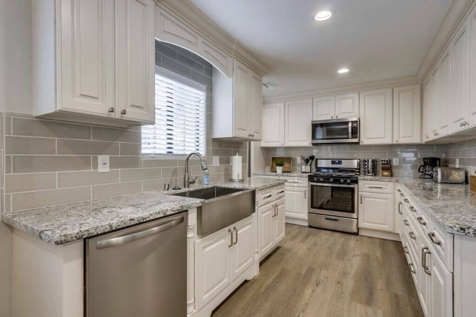 Beautifully Upgraded Kitchen with Stainless Steel Appliances