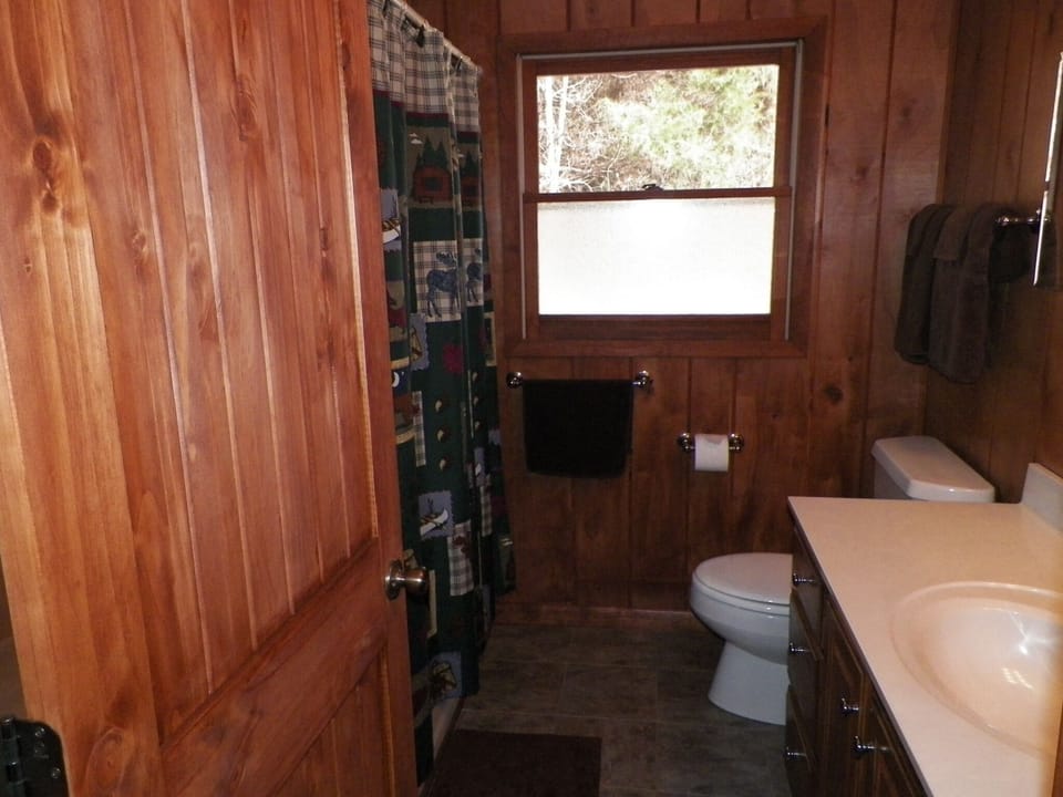 Furnished bathroom (shower and tub) with linens and blowdryer provided