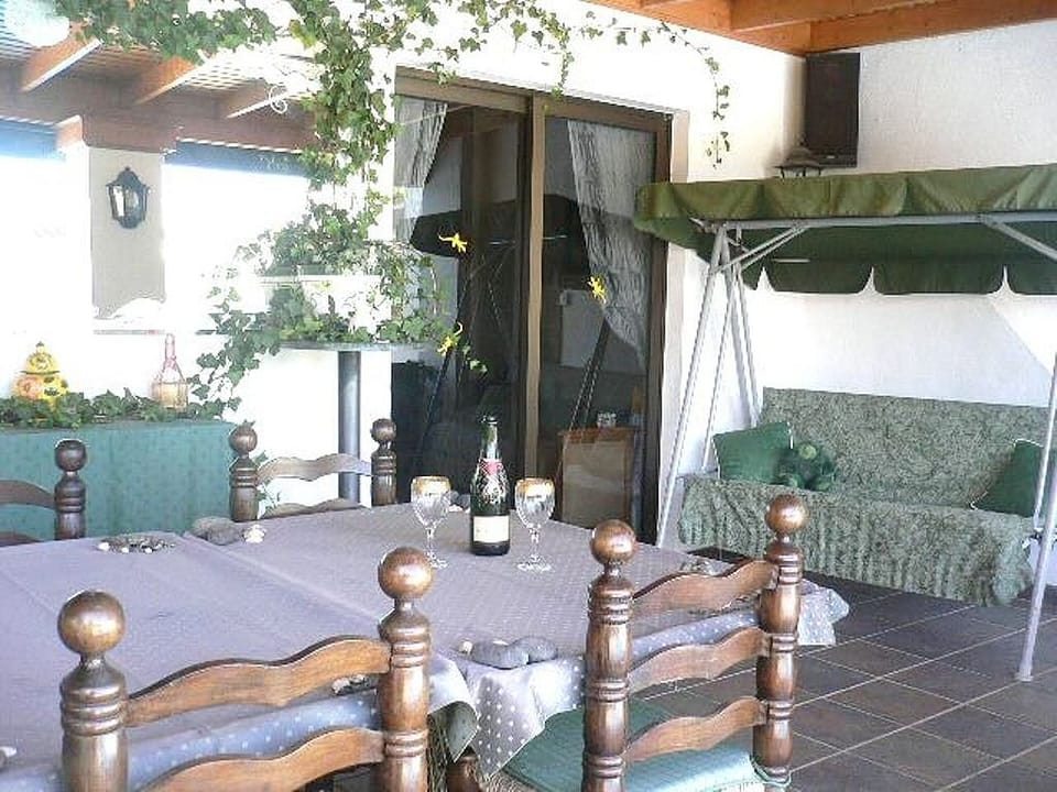 Covered Veranda and Swingy Seat
