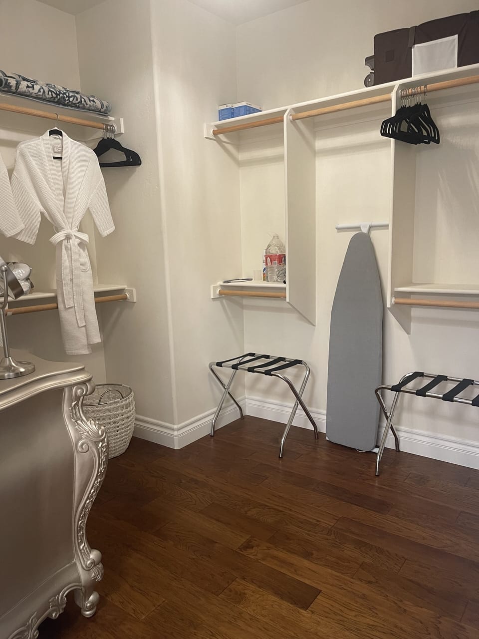 Large Walk in Master Closet with Iron and Ironing Board.  