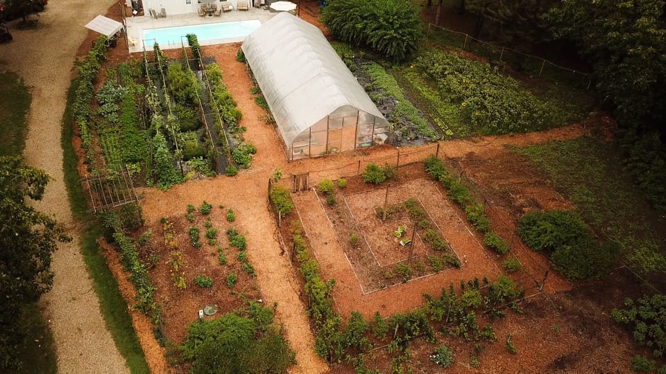 Farm fields and greenhouse. Organic produce available May-Oct with fruit u-picks