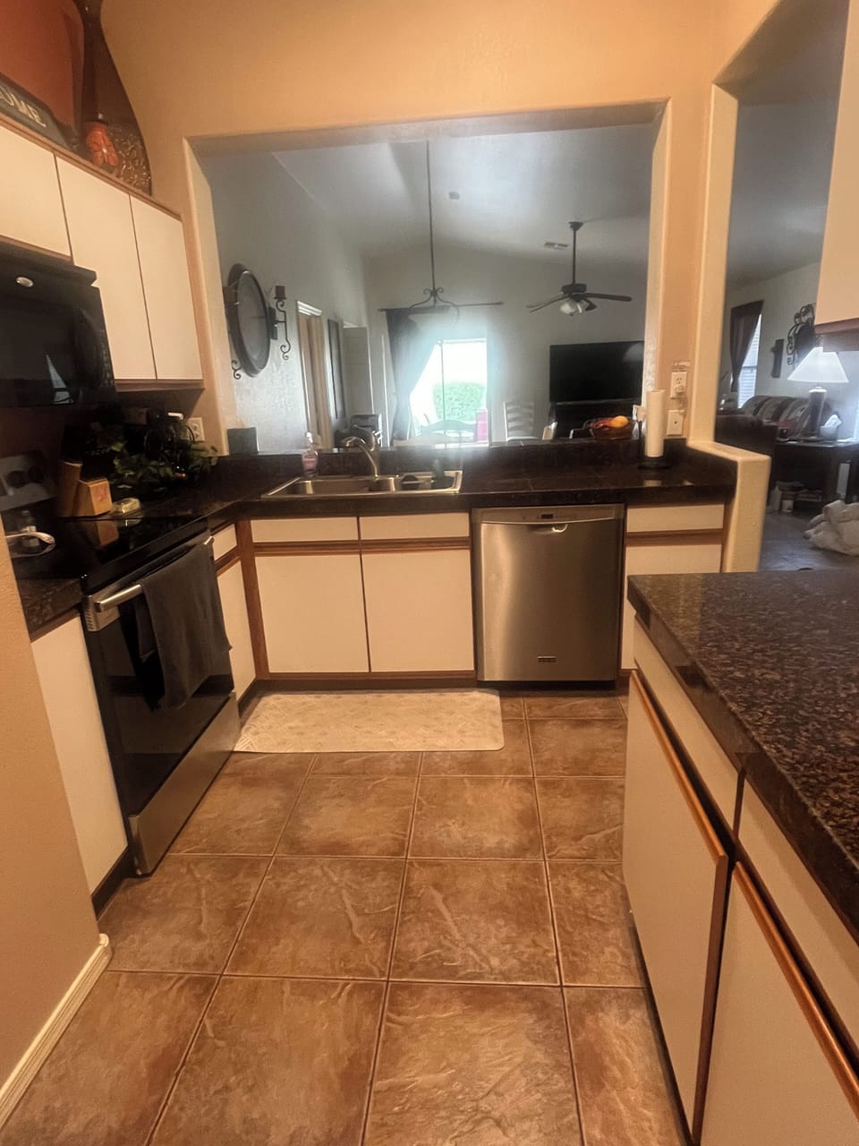 Kitchen with granite counter tops and new dishwasher
