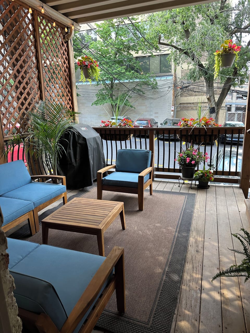 The deck is just outside the kitchen and opens to the secured parking area.