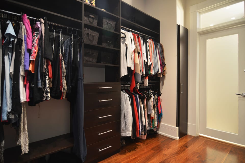 One side of master closet (personal items will be removed)