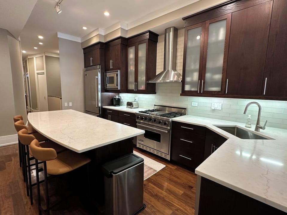 Kitchen has Viking appliances.  Two stools available for ends of island.