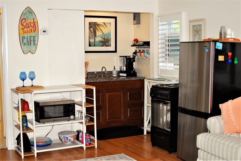 Kitchen equipped with sink, 4 burner range/oven,  microwave, refrig and Keurig 