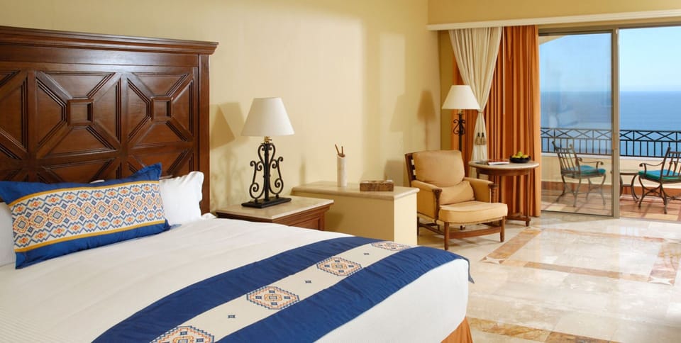 Spacious bedroom with finest linens.  Hear the ocean from your bed.