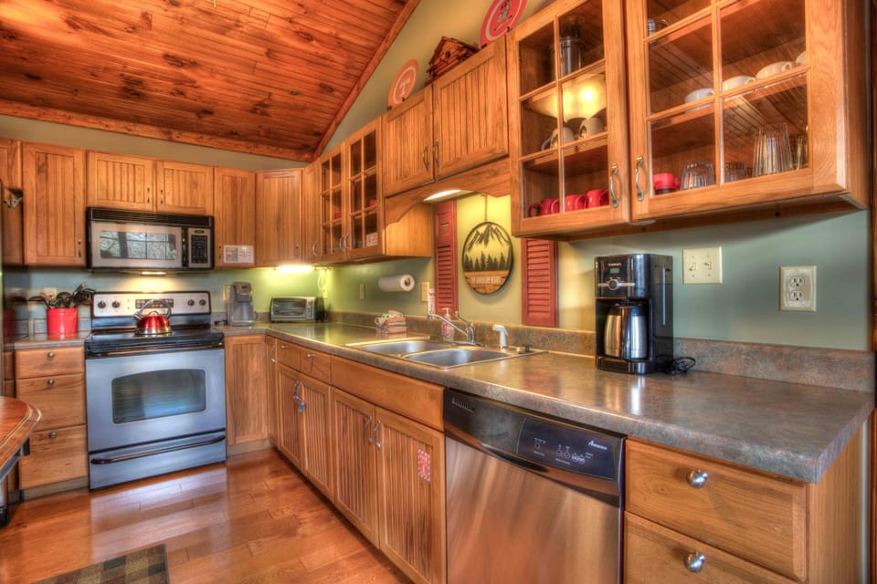 Fully stocked kitchen complete with dishwasher and range