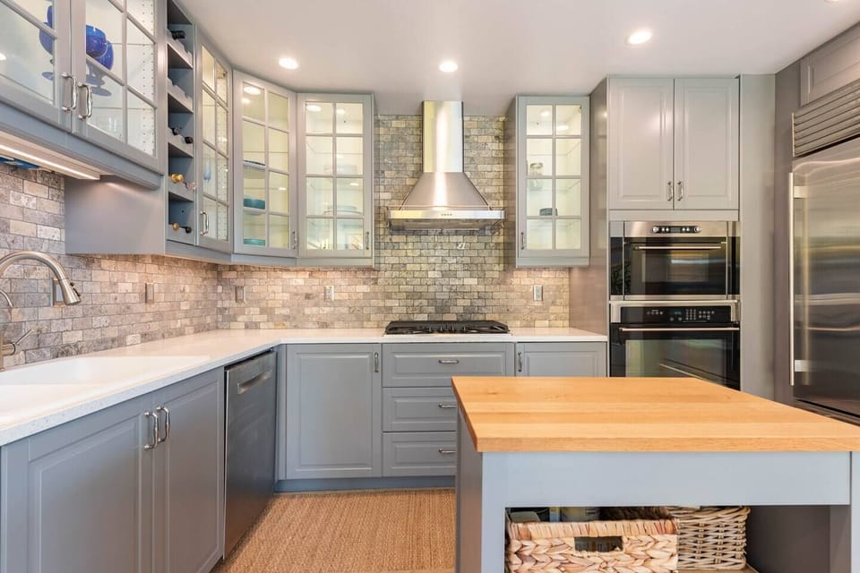 Modern functional kitchen, subzero refrigerator, freezer, gas stove, Oven, micro