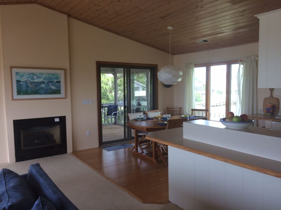 Living & Dining areas. (With gas fireplace = Cozy in winter!) 
