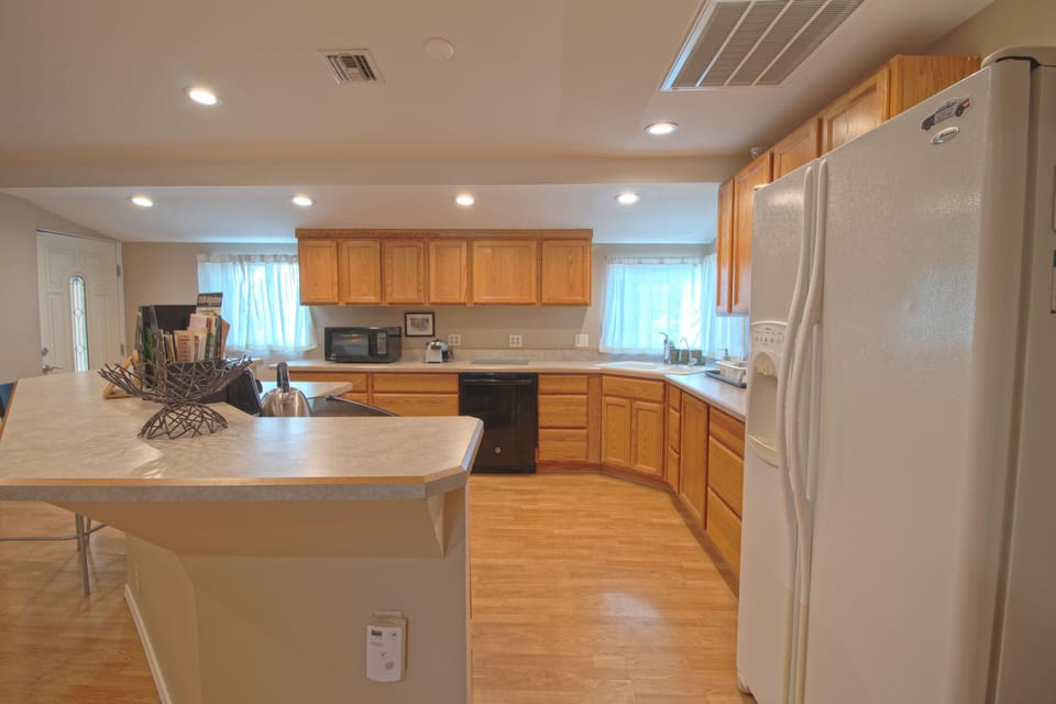 Kitchen is perfect for entertaining. Gather around the island!