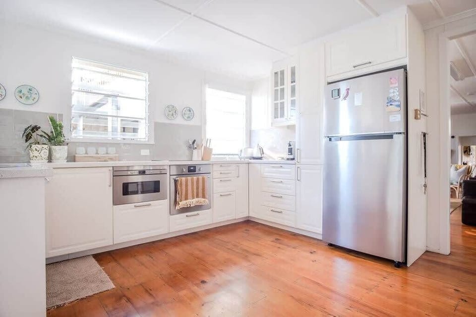 The modernised kitchen, fully equipped for your cooking needs.