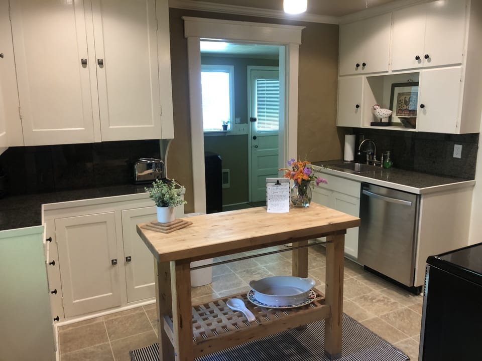 Classic 1905 Kitchen with the necessities.  Includes an extra refrigerator.