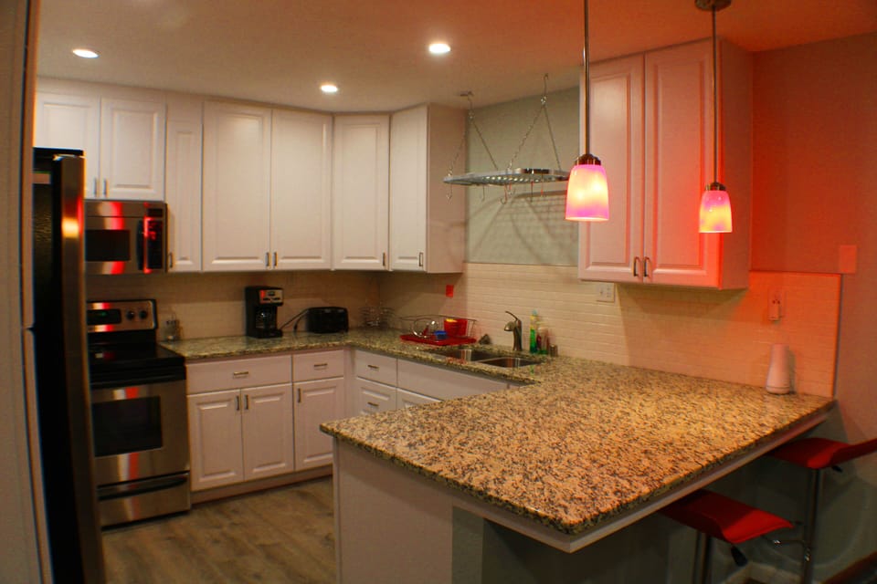 Red pendant lights create the atmosphere with mood lighting 