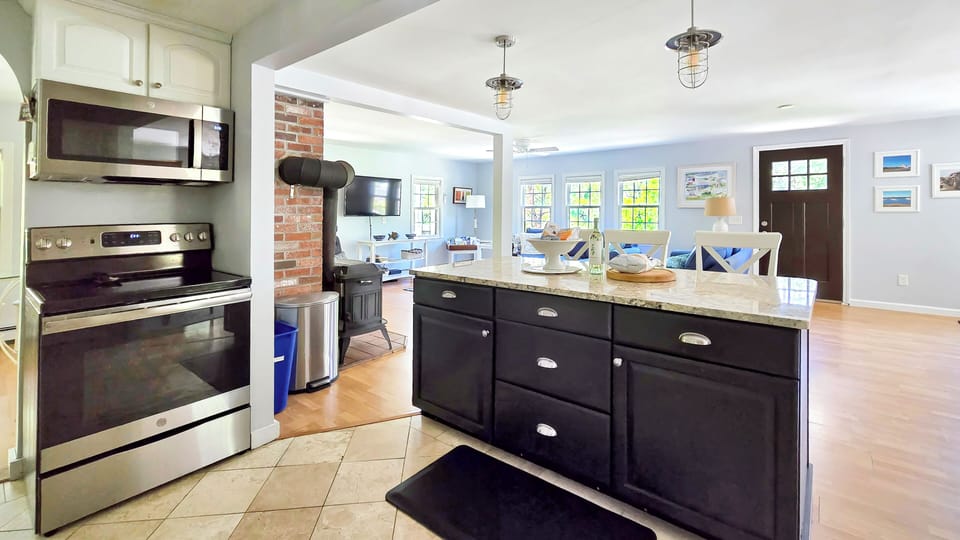 Kitchen opens to the living room and dining area