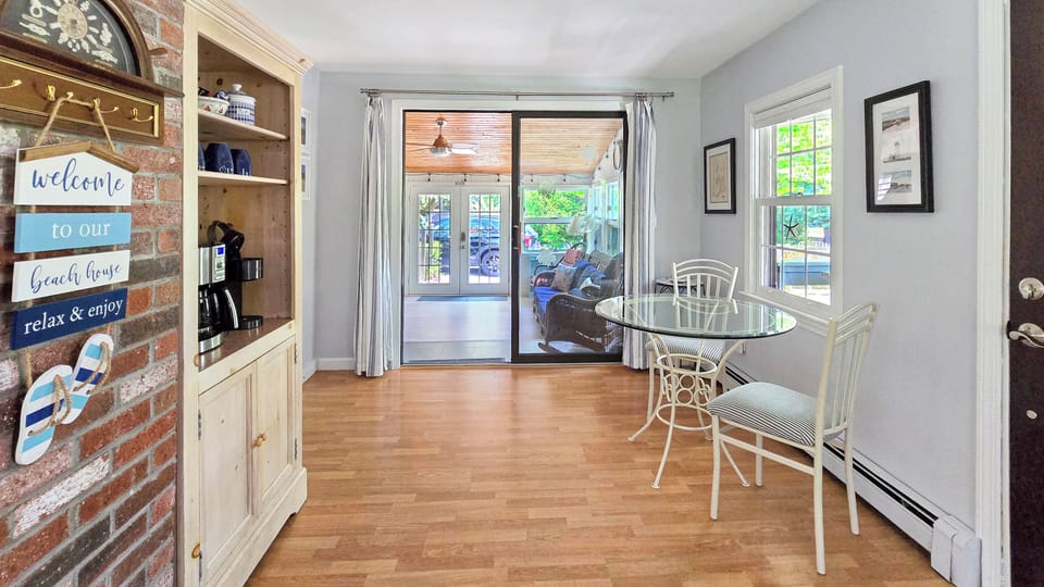 Coffee bar off kitchen leads to sun room