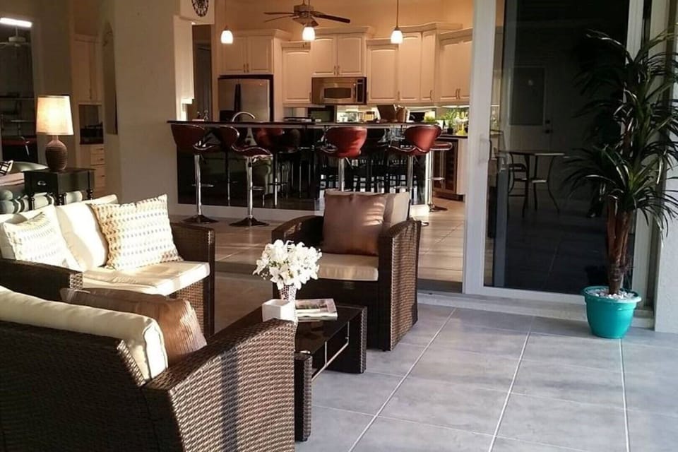 indoor/outdoor room open to kitchen