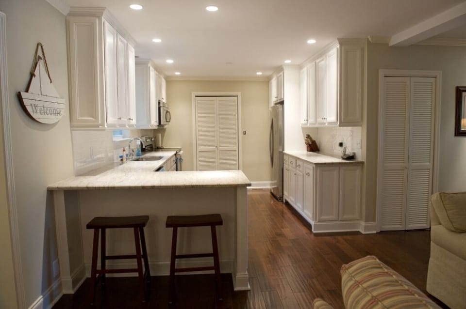 Kitchen with granite countertops and stainless appliances.