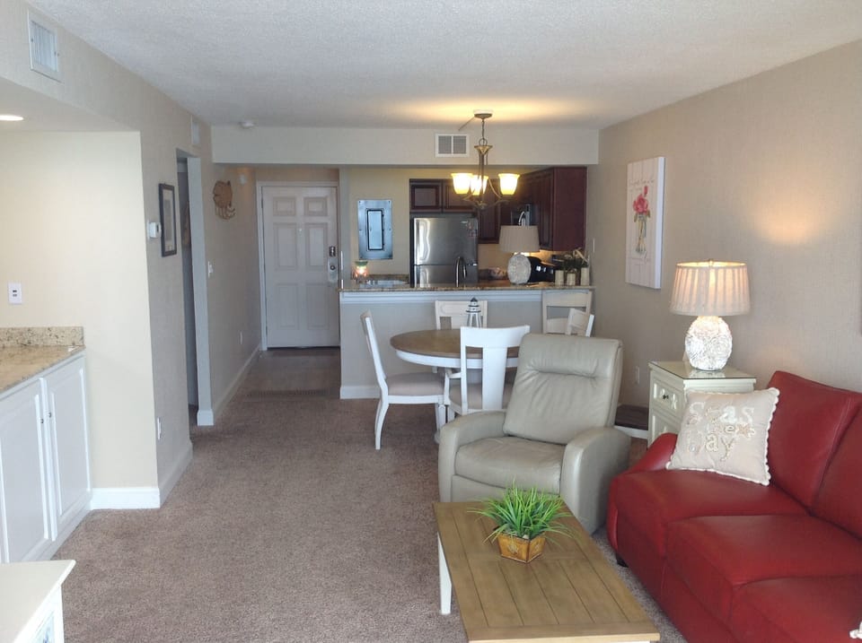 Living and dining area with  2 electric recliners