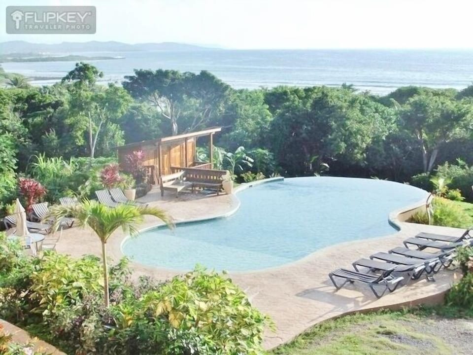 Stunning views of pool & sea from condo.