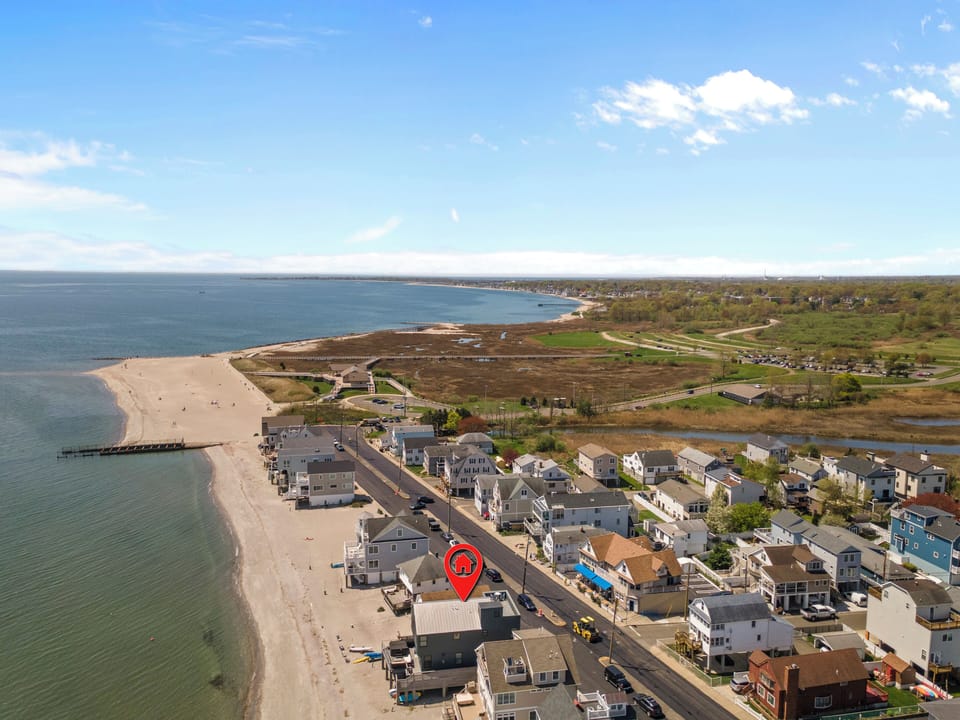 Aerial photo of The Charles Island Beach House.  